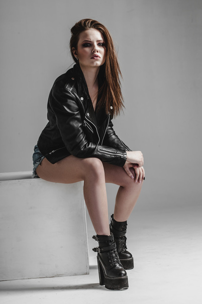 young pretty sexy woman in leather jacket - Foto, Imagem