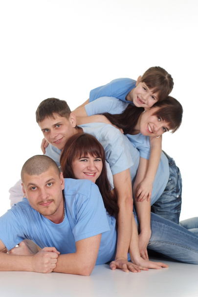 Caucasian beautiful family consisting of five lying on th - 写真・画像