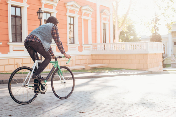 man riding fixed-gear bicycle - Valokuva, kuva
