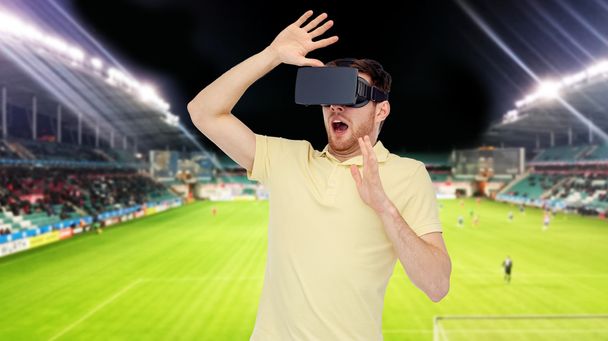 man in virtual reality headset over football field - Foto, Imagen