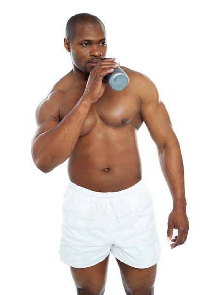 Muscular male drinking health drink - Φωτογραφία, εικόνα