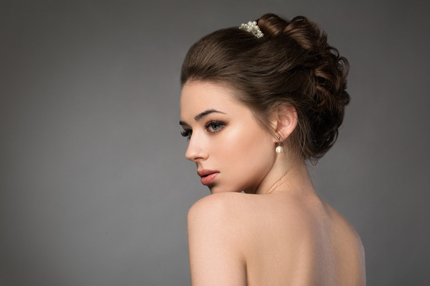 Beautiful sensual brunnete with elegant hairstyle. Wedding acces - Photo, Image