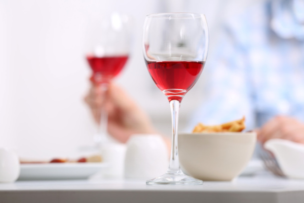 Dinner with glasses of wine  - Foto, Imagen
