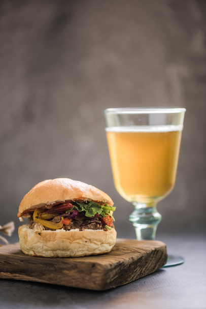 BBQ beef bun and glass of Ale - Photo, Image