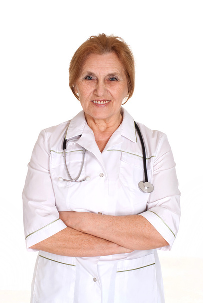 Beautiful old Caucasian nurse is - Fotoğraf, Görsel