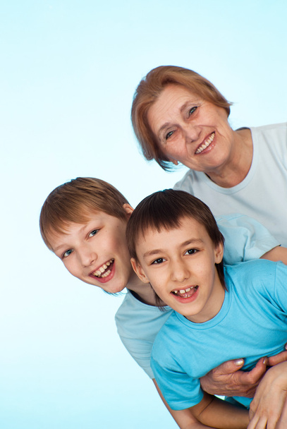 Happy Caucasian grandmother of two boys - Photo, Image