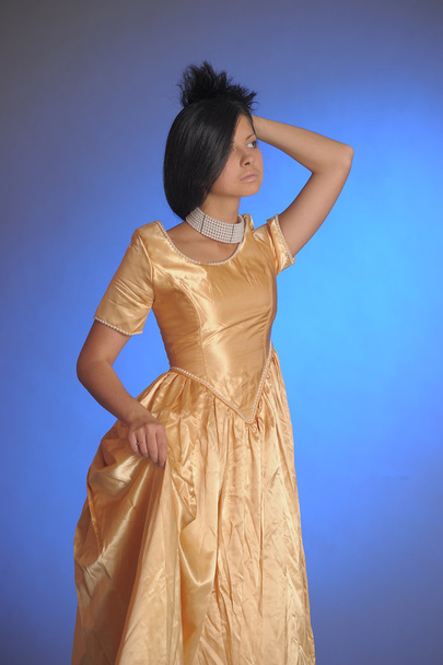 Model in Gold Dress - Zdjęcie, obraz