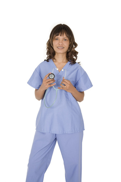 Female African American doctor or nurse wearing a scrubswith a stethoscope isolated on a white background - Φωτογραφία, εικόνα