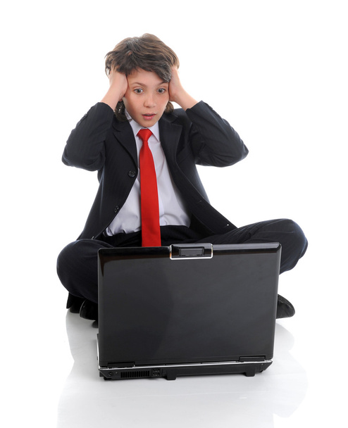 Boy in business suit sitting in front of computer - Foto, imagen