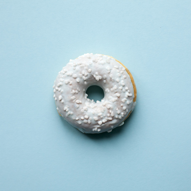 Blue donut. Sweet minimalism - Photo, Image