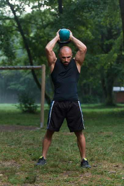 Fitness Kettlebell Swing Exercise Man Workout Outdoors - Zdjęcie, obraz