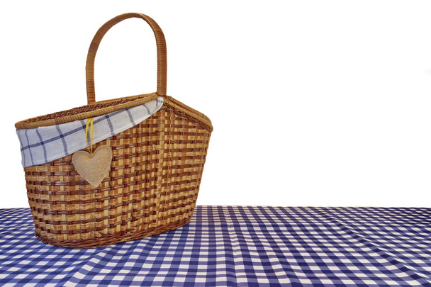 Picnic Basket On The Blue Checkered Tablecloth Isolated On White - Photo, Image