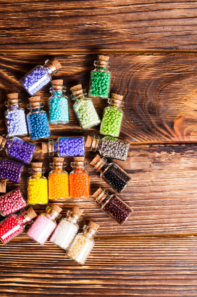 Colorful beads in the bottles - Fotoğraf, Görsel
