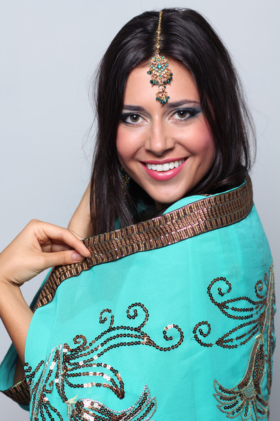 Woman in indian turquoise sari - Foto, imagen