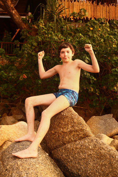 preteen hadsome suntanned boy in swimming slip - Photo, Image