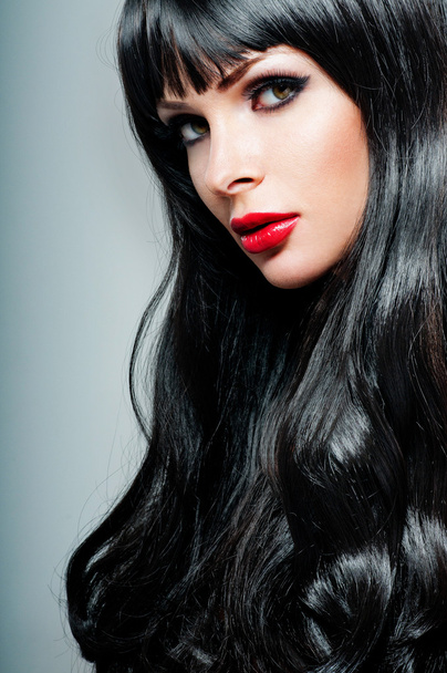 brunette with long hair and red lipstick - Foto, Imagen