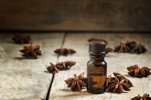 Essential oil of anise in a small brown bottle  - Photo, Image
