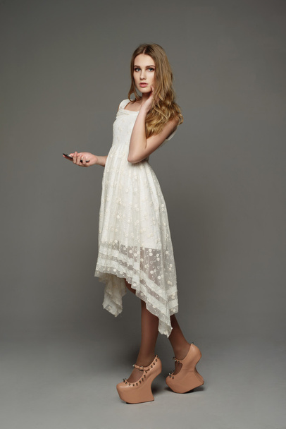 Young girl in unusual lace dress - Photo, Image