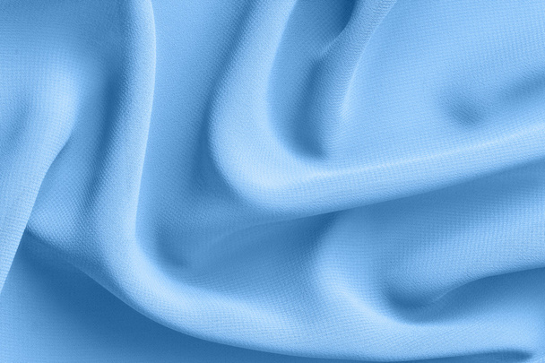 light blue fabric with  folds abstract background - Valokuva, kuva