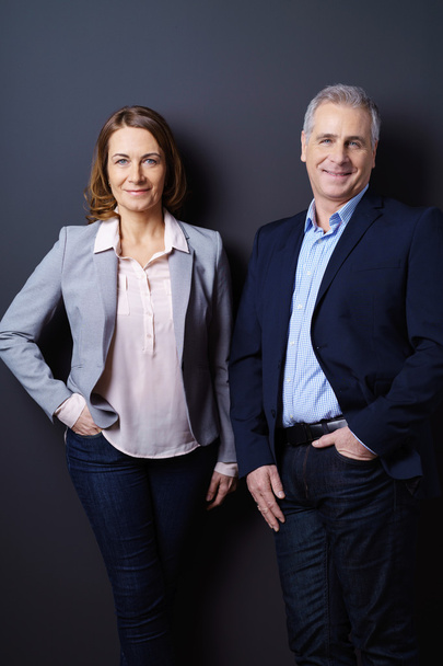 Female and male business partners stand together - Photo, Image