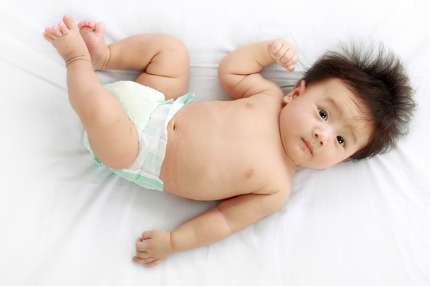 Baby on bed - Photo, image