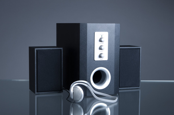 Audio speakers on gray background with reflection - Fotoğraf, Görsel