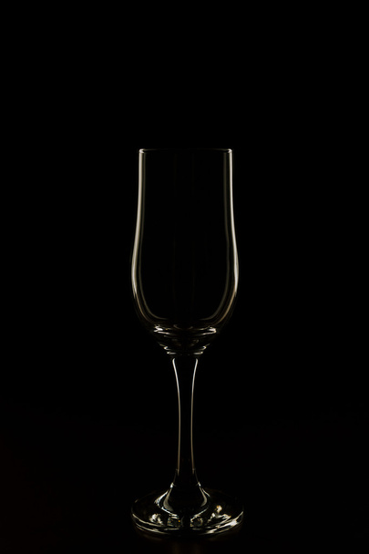 Wine glass on black background - 写真・画像