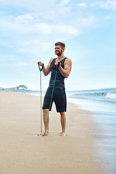 Man Exercising, Doing Fitness Exercises Outdoor On Beach. Sport  - Fotografie, Obrázek