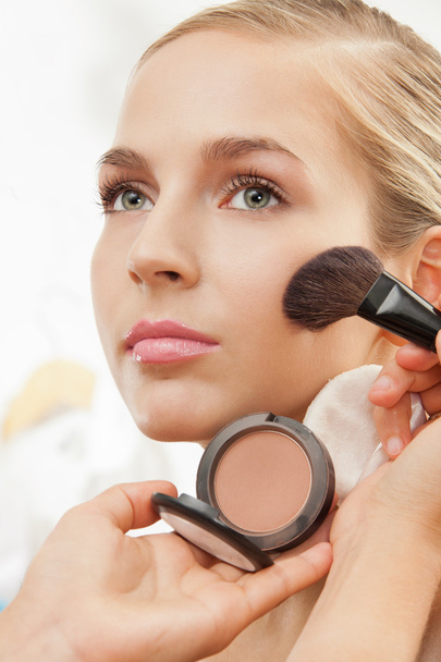 Makeup artist apply blush on cheeks - Fotografie, Obrázek