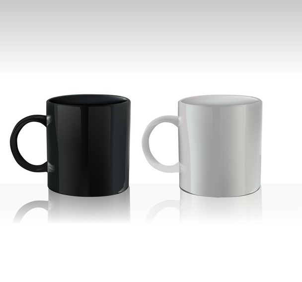 黒とグレーのカップ - 写真・画像