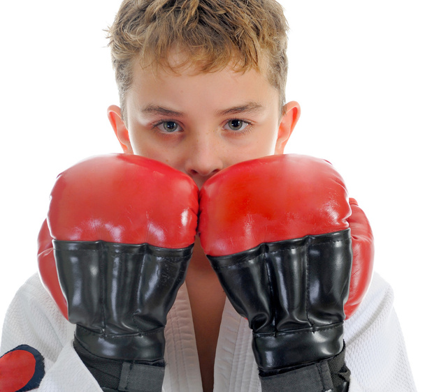 Young boy training karate. - Foto, afbeelding