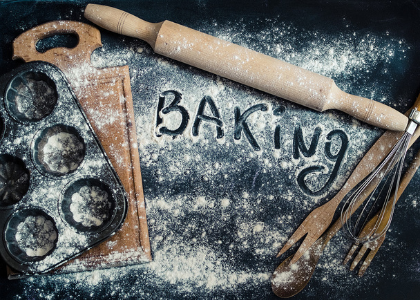 Baking concept on dark background - Фото, изображение
