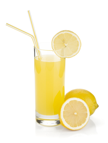 Lemon juice glass and fresh lemons - Photo, Image