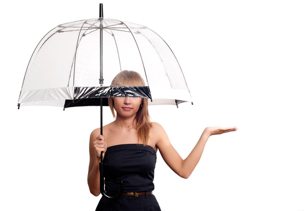 Woman holding umbrella - Foto, afbeelding