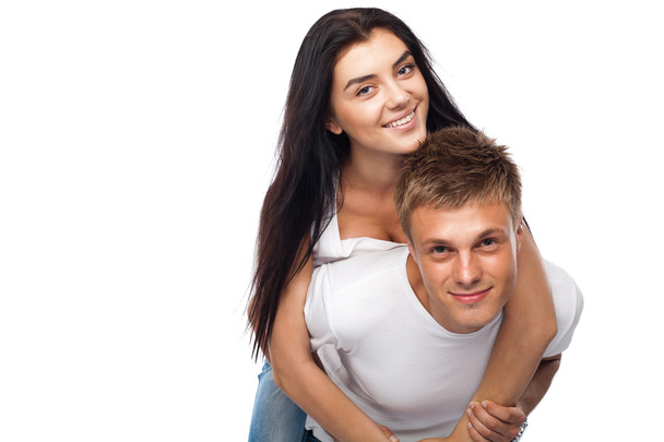Happy young couple in casual clothing - Фото, изображение