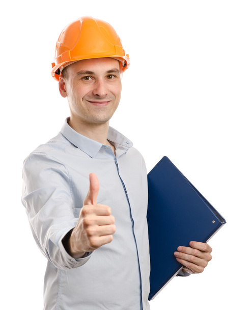 Portrait of young positive manual worker thumbs up - Foto, imagen