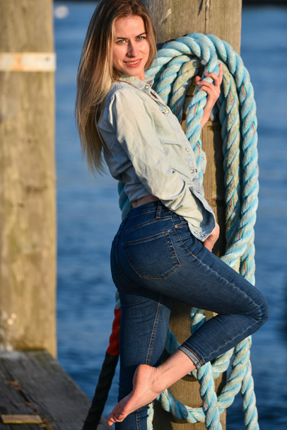 fashion woman on the pier - Φωτογραφία, εικόνα