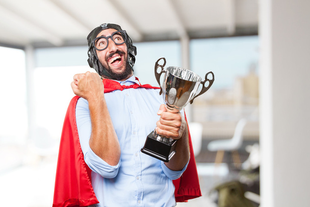 crazy hero man with sports cup - 写真・画像