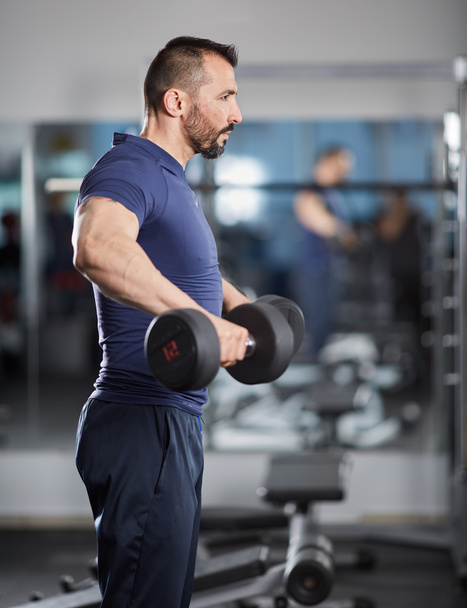 Man doing shoulder workout  - Photo, Image