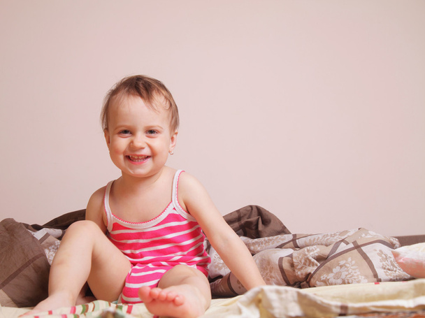 Happy baby girl getting ready for bed (Childhood, security, fami - Фото, изображение