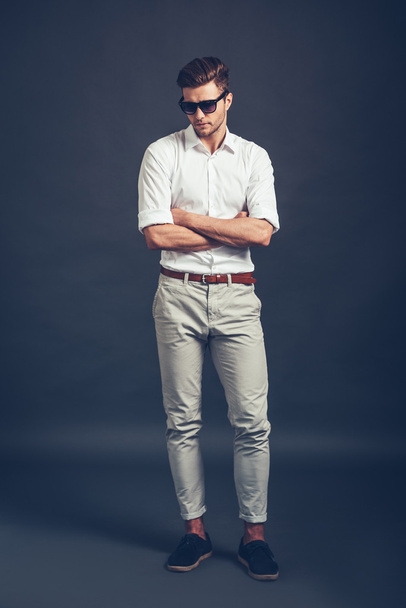 man in sunglasses keeping arms crossed - Photo, image