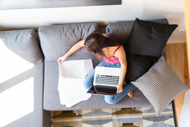 Young woman working at home  - Photo, Image