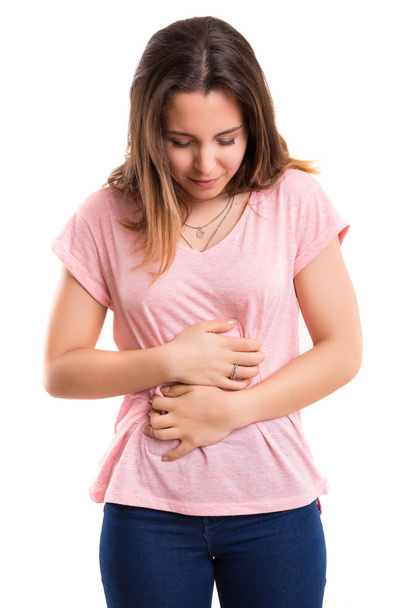 Young woman suffering from stomach ache - Zdjęcie, obraz