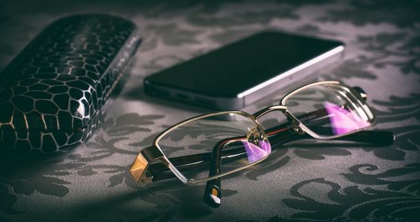 Glasses on the table and spectacle-case - Foto, imagen