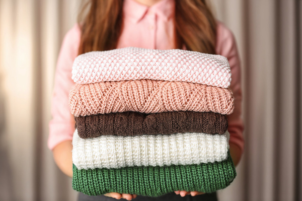 Stack of knitted clothes   - Φωτογραφία, εικόνα