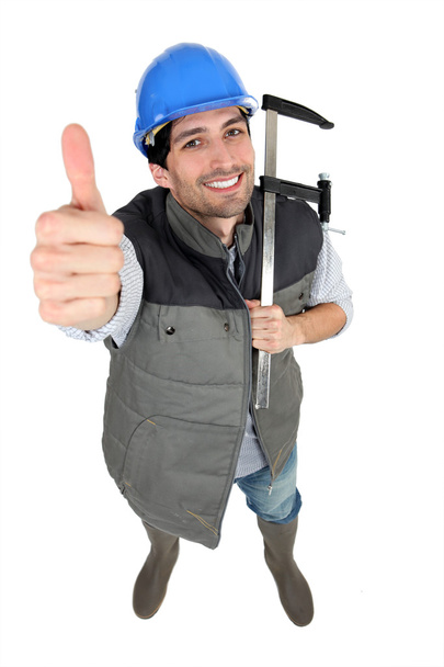High angle shot of builder with thumb up - Photo, image