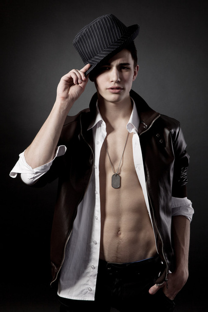 Healthy muscular young man on grey background - Φωτογραφία, εικόνα