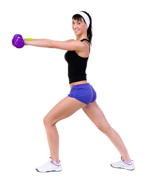 Healthy woman with dumbbells working out - Valokuva, kuva