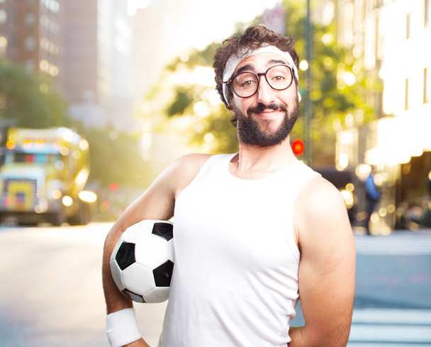 young crazy sportsman with football ball - Zdjęcie, obraz