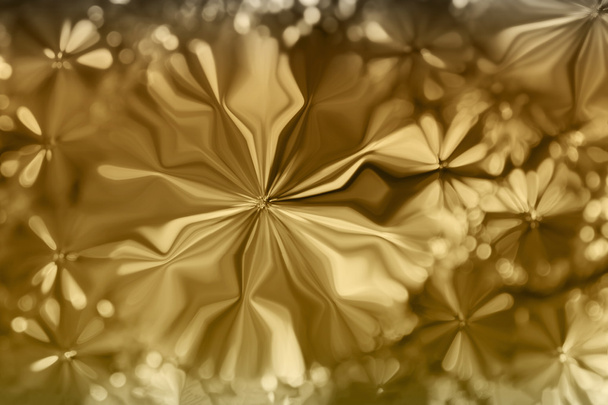 Abstract golden colour flowers shape pattern design background - Photo, Image